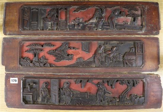 Three Chinese wood carved panels width 64cm height 15cm